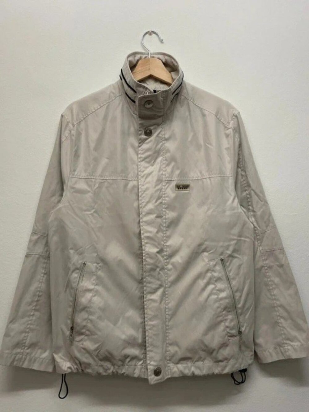 Lightweight beige windbreaker, size M